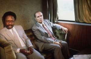Omar Bongo and former French president Francois Mitterrand on the Transgabonais in January 1983. By STF (AFP/File)