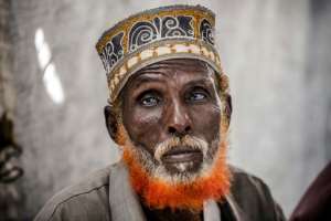Omar Dule, 74, who lost his house in the floods, is among those who have taken shelter at a UN displacement camp in Beledweyne. By LUIS TATO (AFP)