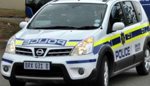 One of the suspects turned himself in at a South African police station, saying he was