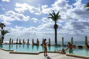 One Tunisian hotelier said it was time to rethink the sector beyond the cliches of 'camels and the beaches'. By ANIS MILI (AFP)
