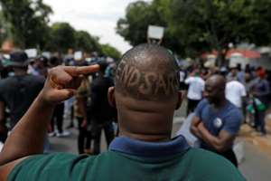 Online messages have called on youths to 'honour the memory of the victims'. By Phill Magakoe (AFP)