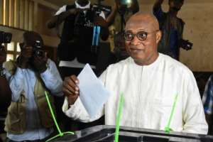 Opposition leader Jean-Pierre Fabre cast his vote in Lome. By PIUS UTOMI EKPEI (AFP)