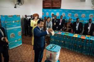 Opposition leaders say they face a crackdown since they began protests over the reelection of Cameroon's President Paul Biya (C). By ALEXIS HUGUET (AFP)