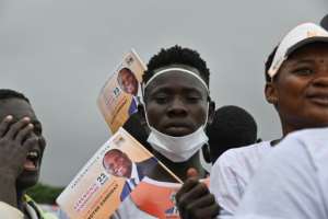 Ouattara supporters listen to him at a campaign rally in Abidjan. By Issouf SANOGO (AFP)