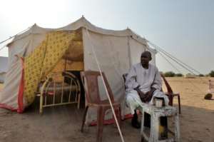 Over 110,000 houses in Sudan have been damaged or destroyed by intense floods forcing people to move. By Mazen Mahdi (AFP)