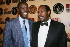 Paul Rusesabagina is pictured with American actor Don Cheadle who played him in the Hollywood film 'Hotel Rwanda'. By CARLO ALLEGRI (Getty/Getty Images/AFP/File)