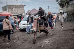 People are fleeing Goma on all forms of transport. By Guerchom NDEBO (AFP)