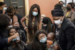 Phoenix saw highly emotional funerals for those who fell victim to vigilante violence. By MARCO LONGARI (AFP/File)