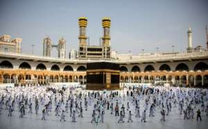 Pilgrims circulate around Kaaba in Mecca's Grand Mosque on Friday, in reduced numbers because of coronavirus. By - (Saudi Ministry of Media/AFP)
