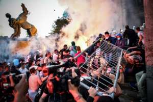 Police fought with outraged demonstrators in Belgrade late on Wednesday, with clouds of tear gas and smoke filling the city centre. By ANDREJ ISAKOVIC (AFP)