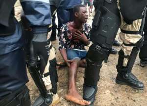 Police fired tear gas to prevent protesters from approaching Parliament in Monrovia. By Carielle Doe (AFP)