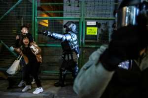Police in Hong Kong cleared protests as demonstrators marked the new year with rallies. By ISAAC LAWRENCE (AFP)