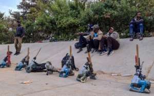 Power tools lined up in front of the work-hungry migrants in Tripoli. By Mahmud TURKIA (AFP)