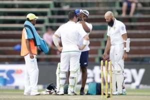 Play was suspended late Friday after a delivery struck South African batsman Dean Elgar on the helmet