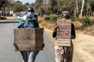Protesters at an anti-corruption march in July. By ZINYANGE AUNTONY (AFP/File)