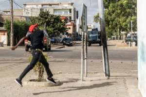 Protesters are angry Sunday's controversial parliamentary polls were held without a single opposition candidate. By Yanick Folly (AFP)