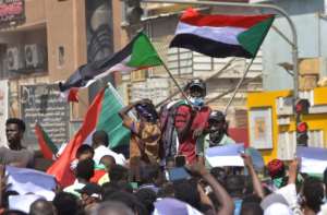 Protesters backing civilian rule demonstrate in Sudan; the two sides represent opposing factions of the Forces for Freedom and Change (FFC), which spearheaded demonstrations that led to the army's overthrow of Omar al-Bashir. By - (AFP)