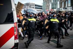 Protesters frustrated by coronavirus restrictions have clashed with police in the Netherlands. By ROB ENGELAAR (ANP/AFP)