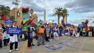 Protesters gather in Libya's capital Tripoli to rally against the candidacy of Seif al-Islam Kadhafi, son of slain dictator Moamer Kadhafi. By Mahmud Turkia (AFP)