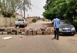 Protesters have thrown up makeshift barricades on many minor roads in residential districts of Khartoum. By - (AFP)