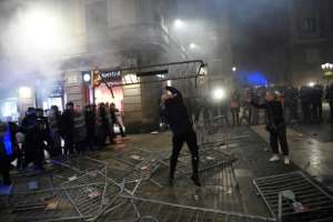 Protestors and police clashed in the Spanish city of Barcelona over new coronavirus restrictions. By Josep LAGO (AFP)