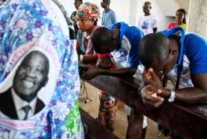 Prayers for reconciliation: Many wonder whether Ivory Coast can heal its wounds. By SIA KAMBOU (AFP)