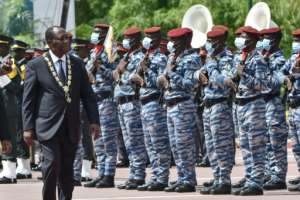 President Alassane Ouattara has been accused of flouting constitutional limits to seek a third term.  By SIA KAMBOU (POOL / AFP / File)