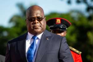 President Felix Tshisekedi must govern in coalition with the former president's supporters who have a commanding majority in parliament. By Sumy Sadurni (AFP/File)