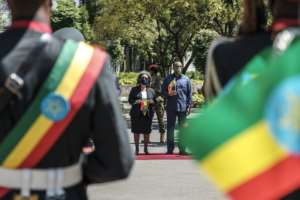 Prime Minister Abiy Ahmed, right, standing next to President Sahle-Work Zewde at ceremonies in Addis on Tuesday in honour of the armed forces. By EDUARDO SOTERAS (AFP)