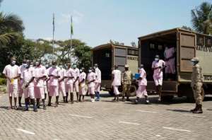 Prison warders guard the defendants in the case. By Simon WOHLFAHRT (AFP)
