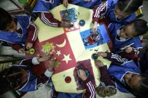 Pupils participate in a handicraft workshop at the Mahaba school on October 13, 2018. By Mohamed el-Shahed (AFP)