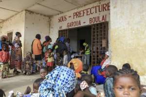 Refugees from the Central African Republic wait in line to register after crossing into Cameroon. By Daniel Beloumou Olomo (AFP)