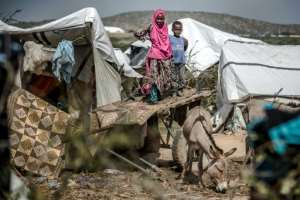 Repeated disasters are grinding down resilience, say experts. Climate victims have no time to rebuild homes and food stocks before the next extreme weather event strikes -- a challenge worsened by Somalia's conflict. By LUIS TATO (AFP)