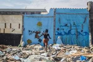 Residents often return to their old neighbourhoods to rebuild their homes. By Yanick FOLLY (AFP)