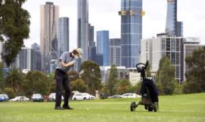 Residents of Melbourne dashed back to reopened salons and golf courses. By William WEST (AFP)