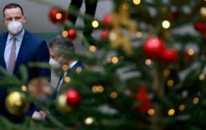 Rising infections of the Delta variant had already left businesses fearing another grim Christmas. By Odd ANDERSEN (AFP)