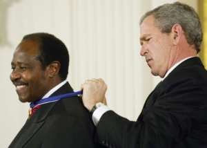 Rusesabagina received the Presidential Medal of Freedom from US President George W. Bush in 2005. By MANDEL NGAN (AFP)