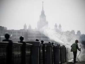 Russia, where municipal workers are disinfecting Moscow's streets, gas now closed its border to slow the spread of coronavirus. By Alexander NEMENOV (AFP)