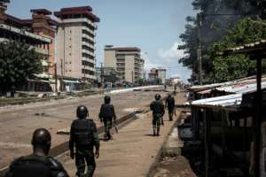 Scores of people were killed in clashes after Conde announced he would bid for a third term in office. By JOHN WESSELS (AFP)
