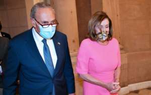 Schumer (L) and Pelosi have dismissed Trump's unilateral extension of a virus relief package. By MANDEL NGAN (AFP/File)