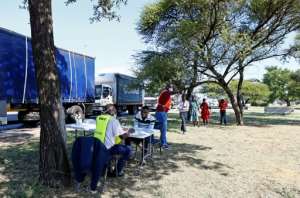 Screening ahead of South Africa's lockdown to begin on Thursday. By Phill Magakoe (AFP)