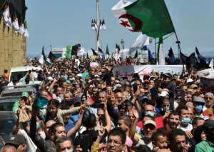 Security forces have deployed in strength to prevent reform movement protests like this one in Algiers on May 7. By RYAD KRAMDI (AFP)