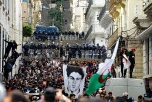 Security forces were deployed in Algiers, as thousands of protesters marched toward the central Grand Post Office. By - (AFP)