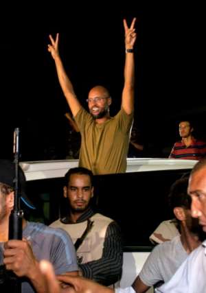 Seif al-Islam, seen in this August 2011 picture, is wanted by the International Criminal Court for war crimes committed during Libya's 2011 uprising that saw his father dictator Moamer Kadhafi toppled and killed. By DARIO LOPEZ-MILLS (AFP/File)