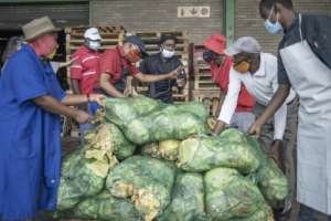 Sellers often have to be convinced to donate apparently gone-off produce for fear of litigation. By Michele Spatari (AFP)