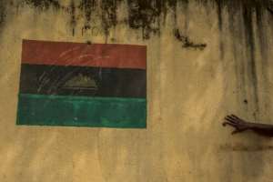 Separatism: Drawing of the Biafran flag on a wall of the pro-independence region of Umuahaia. By CRISTINA ALDEHUELA (AFP)