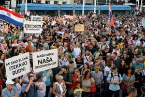 Several thousands demonstrated in Zagreb to protest against virus curbs. By DENIS LOVROVIC (AFP)