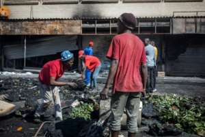 Shops were also looted in the impoverished township of Alexandra. By Michele Spatari (AFP)