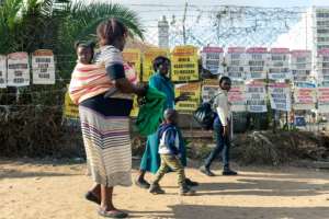 Shops remained open and people went about their daily business in Harare as Zimbabweans expressed mixed opinions about Mugabe's legacy. By Jekesai NJIKIZANA (AFP)