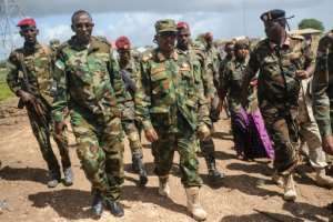 Somali military chief General Abdiweli Jama Gorod (C) visits Sanguuni military base, where a US special operations soldier was killed by a mortar attack in June 2018. By Mohamed ABDIWAHAB (AFP/File)